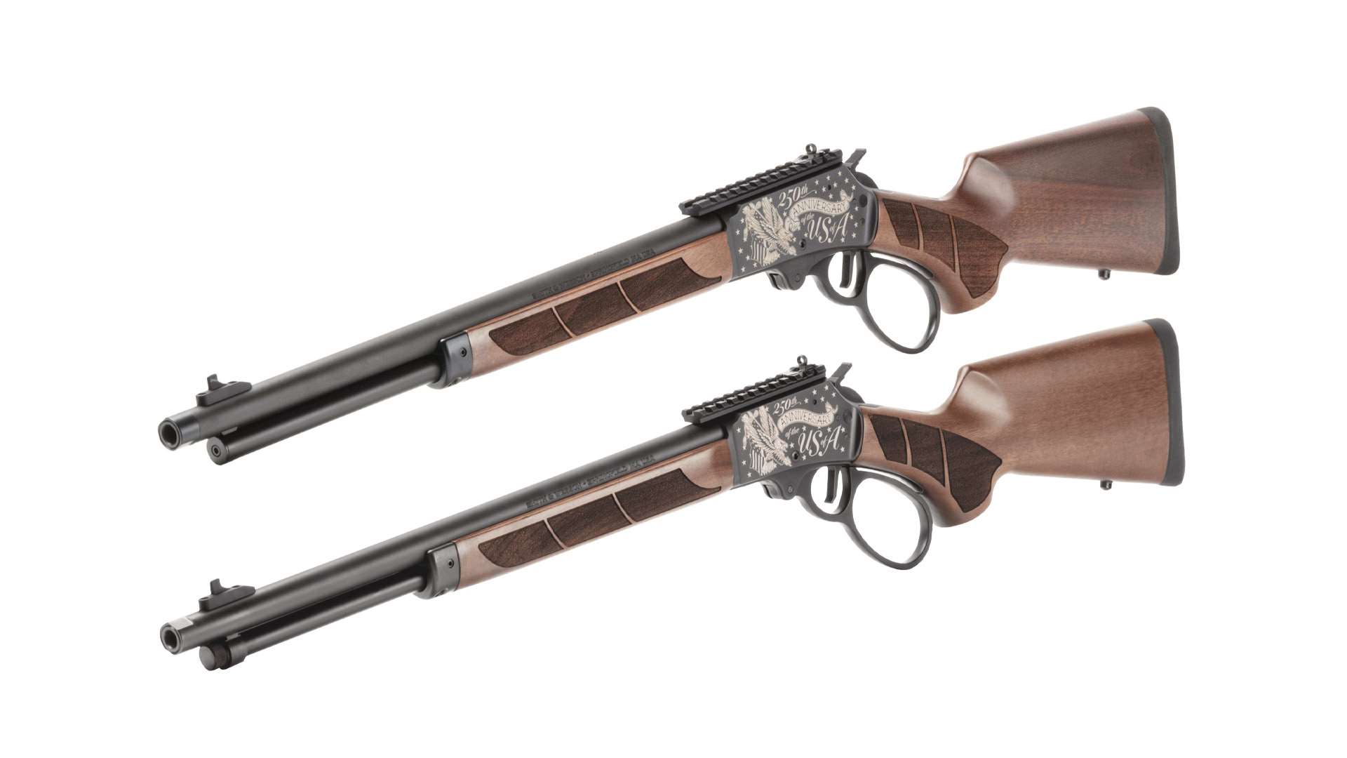 Both Smith &amp; Wesson America 250 Model 1854 lever-action rifles shown staggered, in .44 Magnum and .45-70 Government, with walnut furniture, textured grip panels, engraved receivers and Picatinny rails
