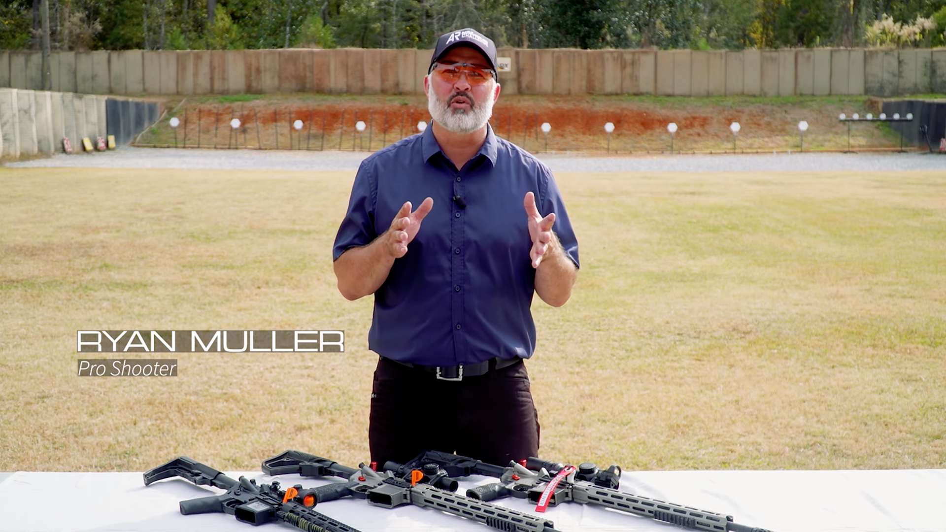 Pro shooter Ryan Muller explaining the three equipment divisions in NRA America’s Rifle Challenge during instructional video