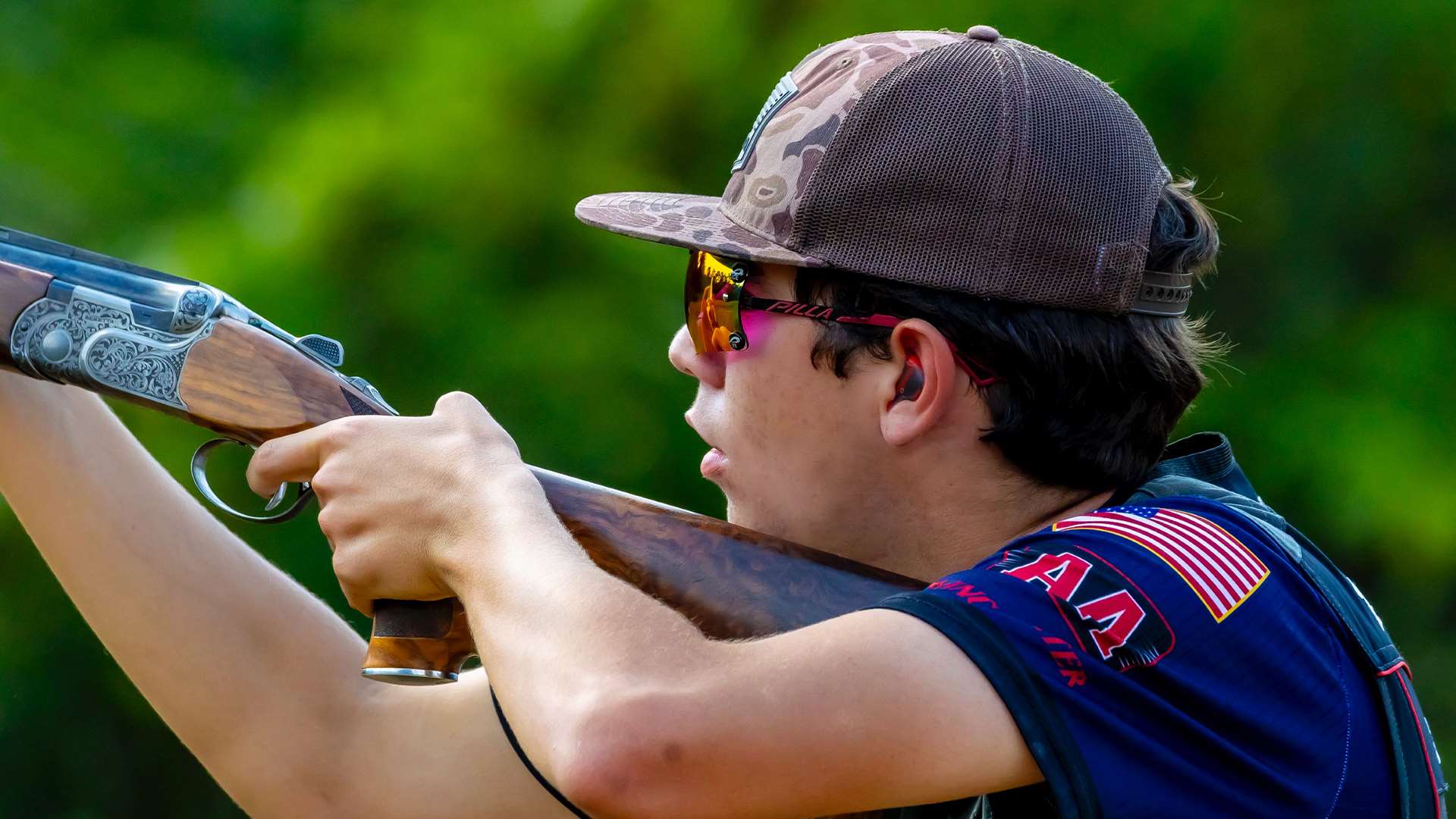 Connor Daniel prepares to shoot his Beretta DT11 shotgun