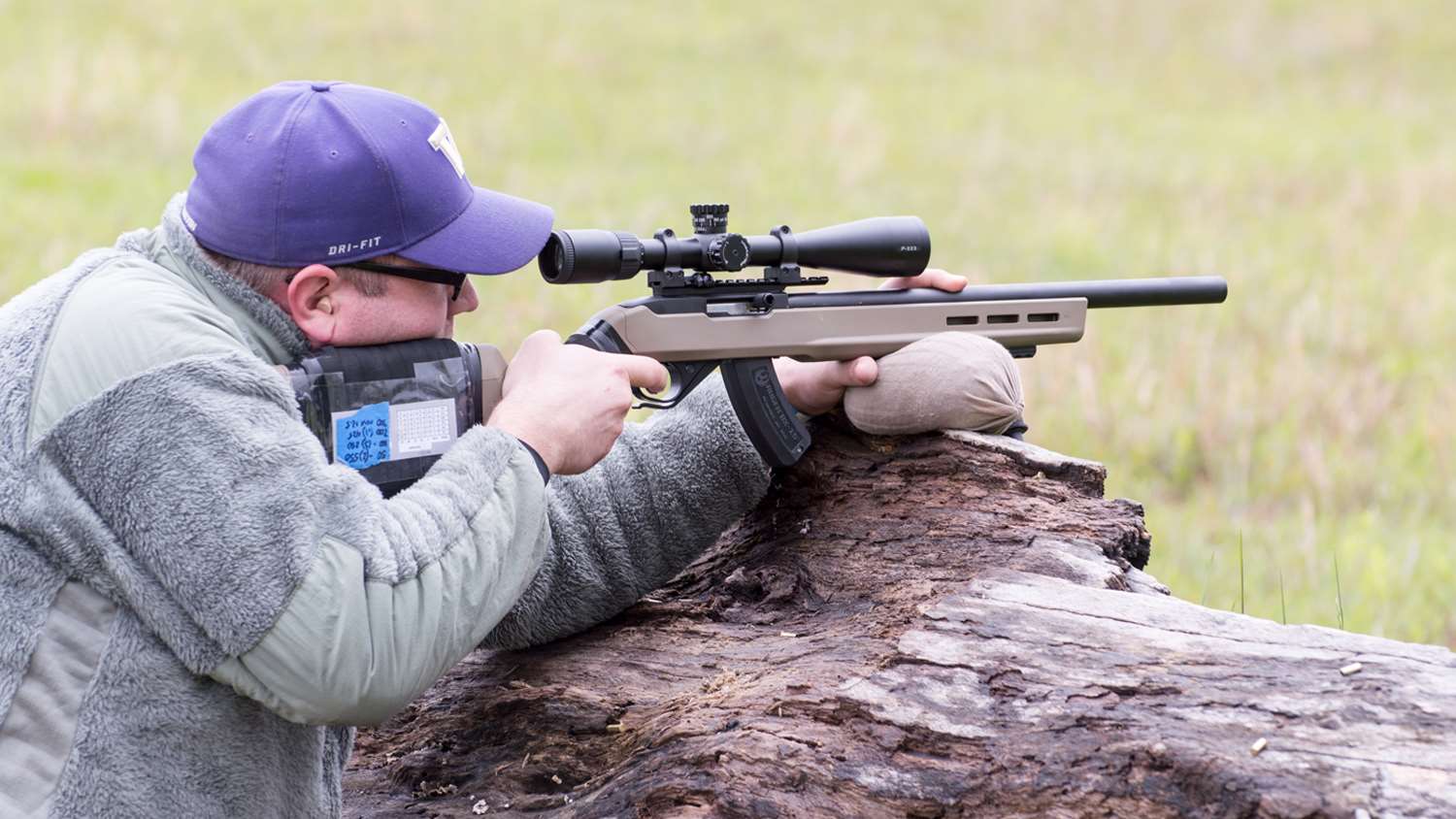 Rimfire challenge firing position on log