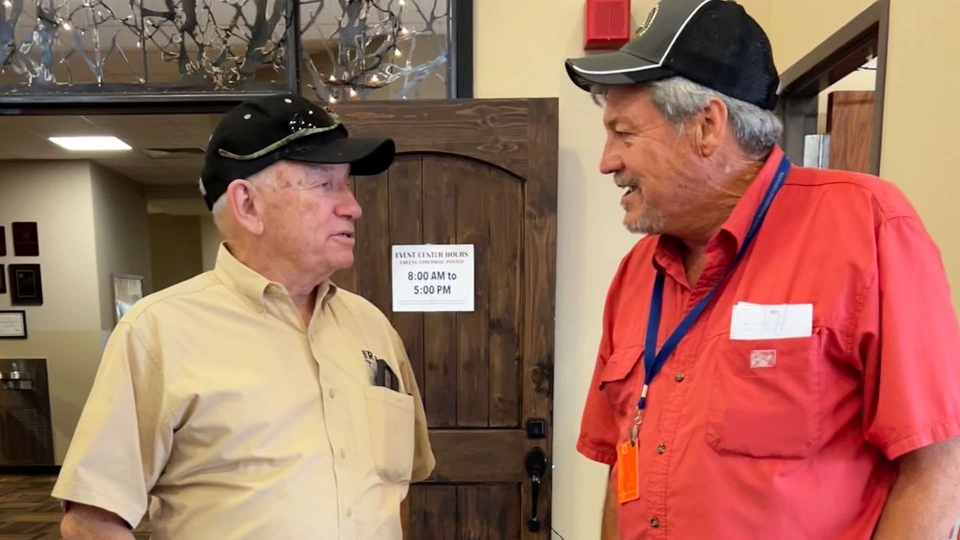 Charles Cotton speaking with volunteer