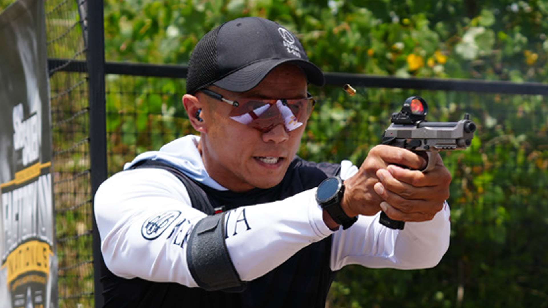 JJ Racaza shooting Carry Optics pistol