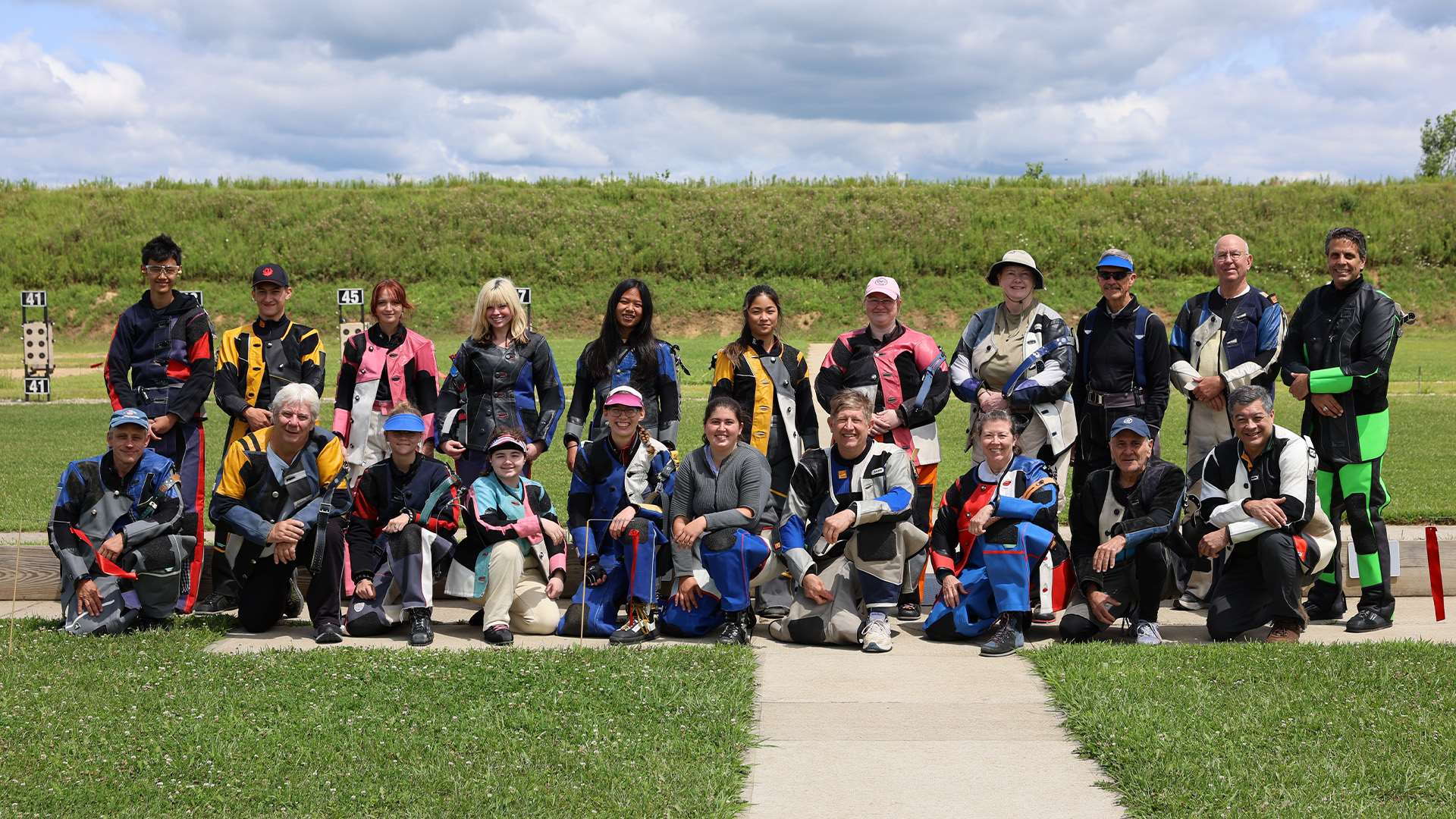 Smallbore Position competitors gathered on the range at the Cardinal Shooting Center for a group photograph