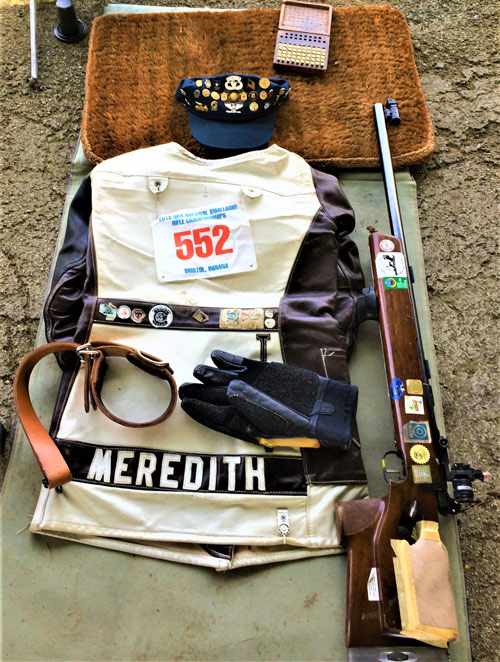 Bruce Meredith&#x27;s shooting jacket and rifle