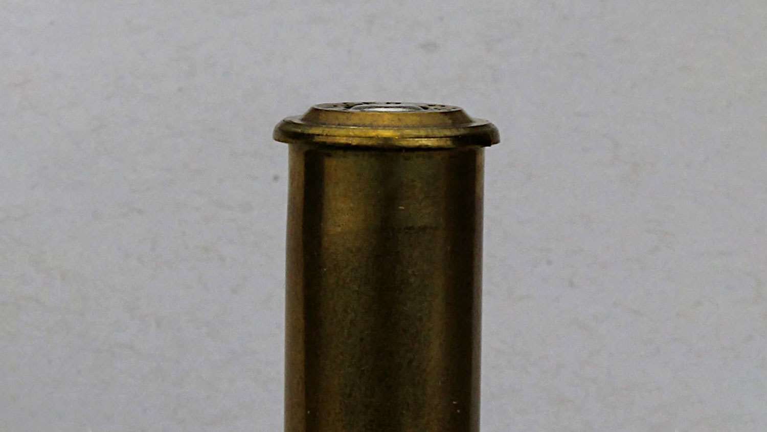 The odd raised bevel on the first Mauser cartridge’s head helped compensate for black powder fouling.