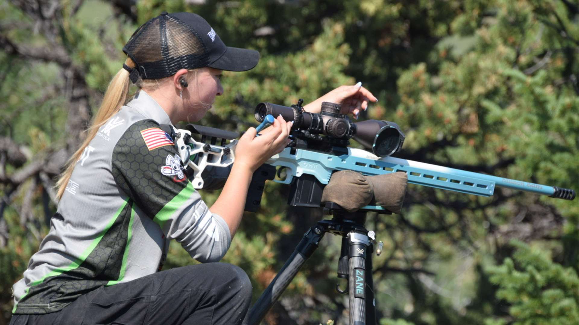 Allison Zane adjusts her optic