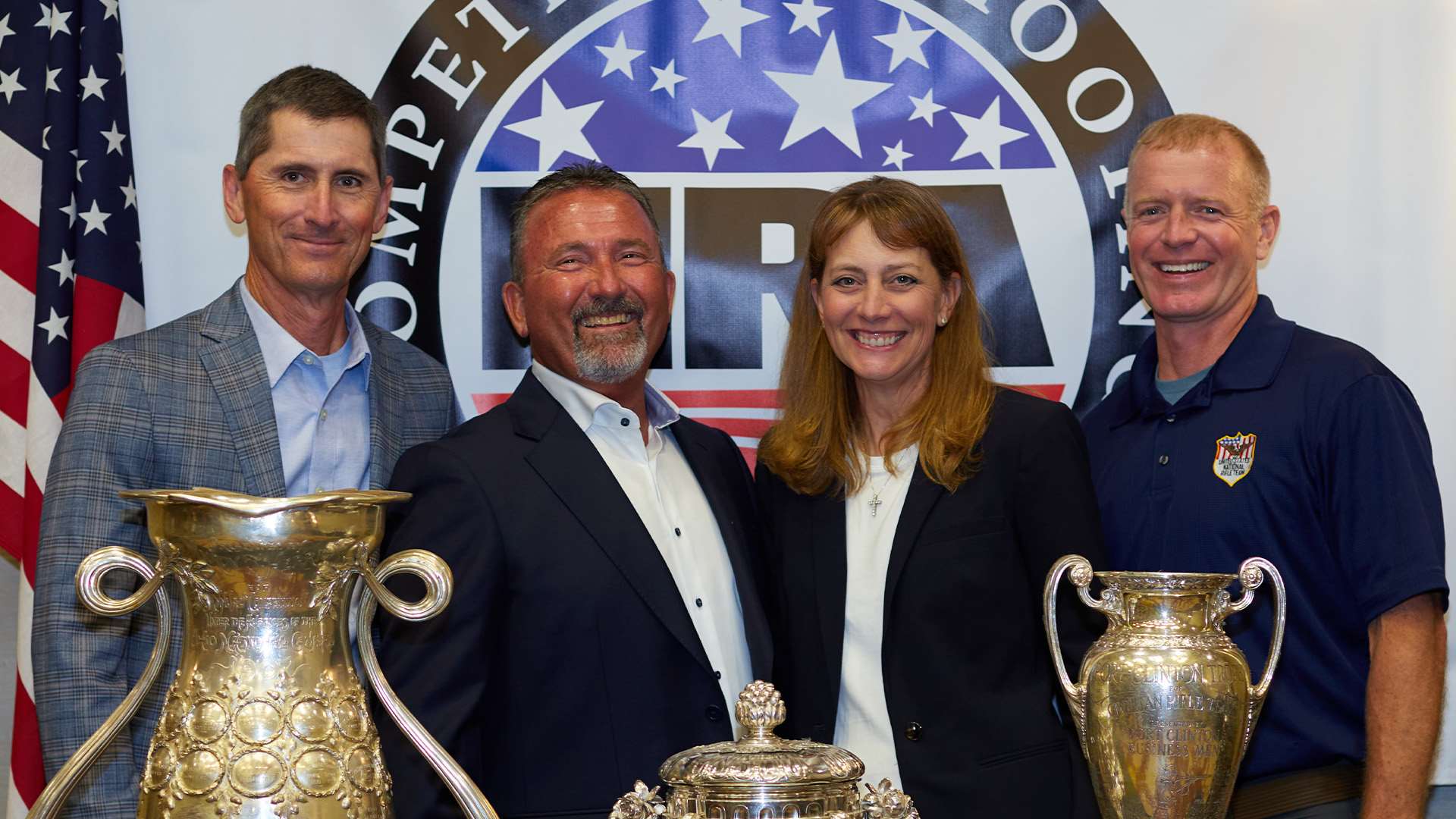 Charles Rowe, Bob Gill, Kim Rowe and Brandon Green standing together at the Long-Range Championship awards ceremony