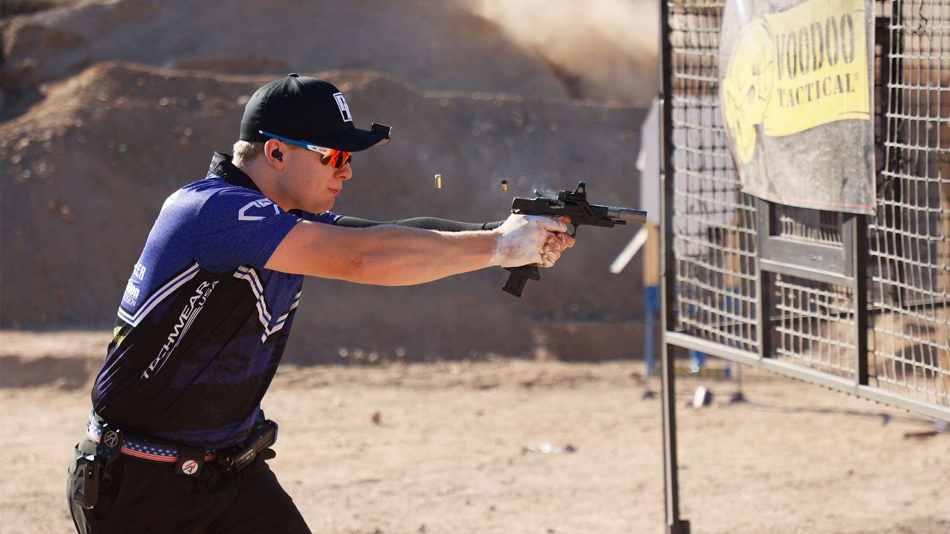 Christian Sailer shooting a handgun