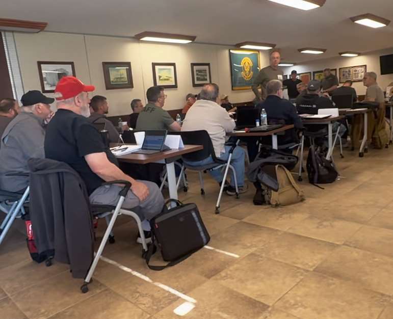 Attendees at the 2026 NRA America’s Rifle Challenge Match Director Summit during classroom instruction at Camp Atterbury, Indiana