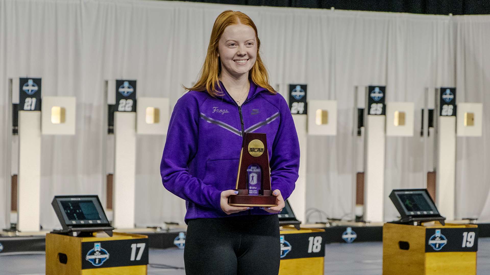 Katie Zaun with smallbore third place award at 2025 NCAA rifle championship
