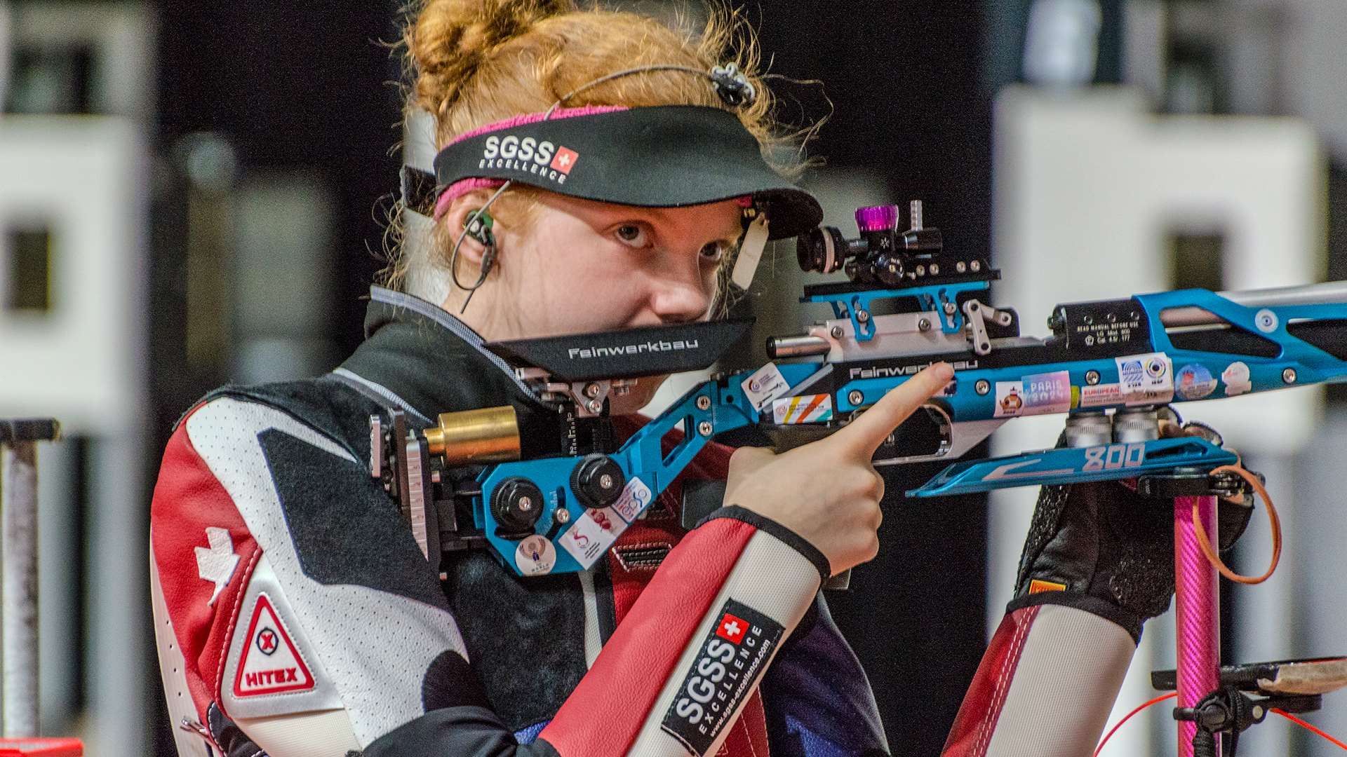 Audrey Gogniat eyes the scoreboard during the 2026 NCAA air rifle individual championship final at Ohio State's Covelli Center