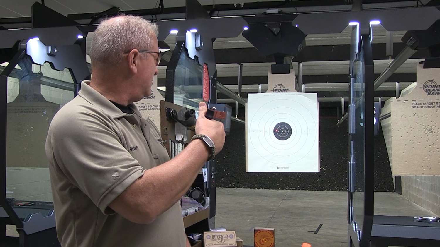 Brian demonstrating red dot aiming with a SIRT training gun