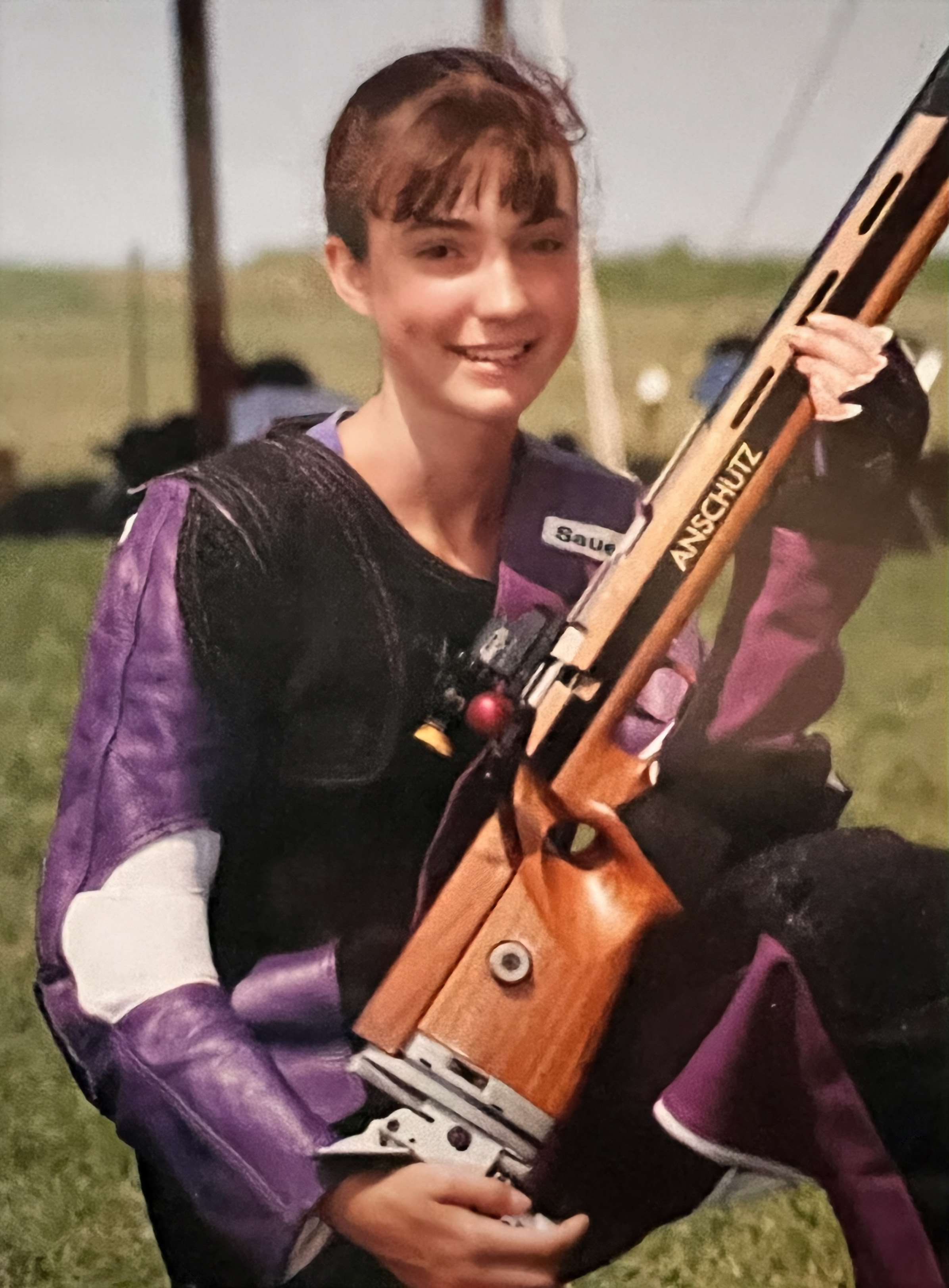 Heidi Magee holding her Anschutz smallbore rifle at Camp Perry in 1998