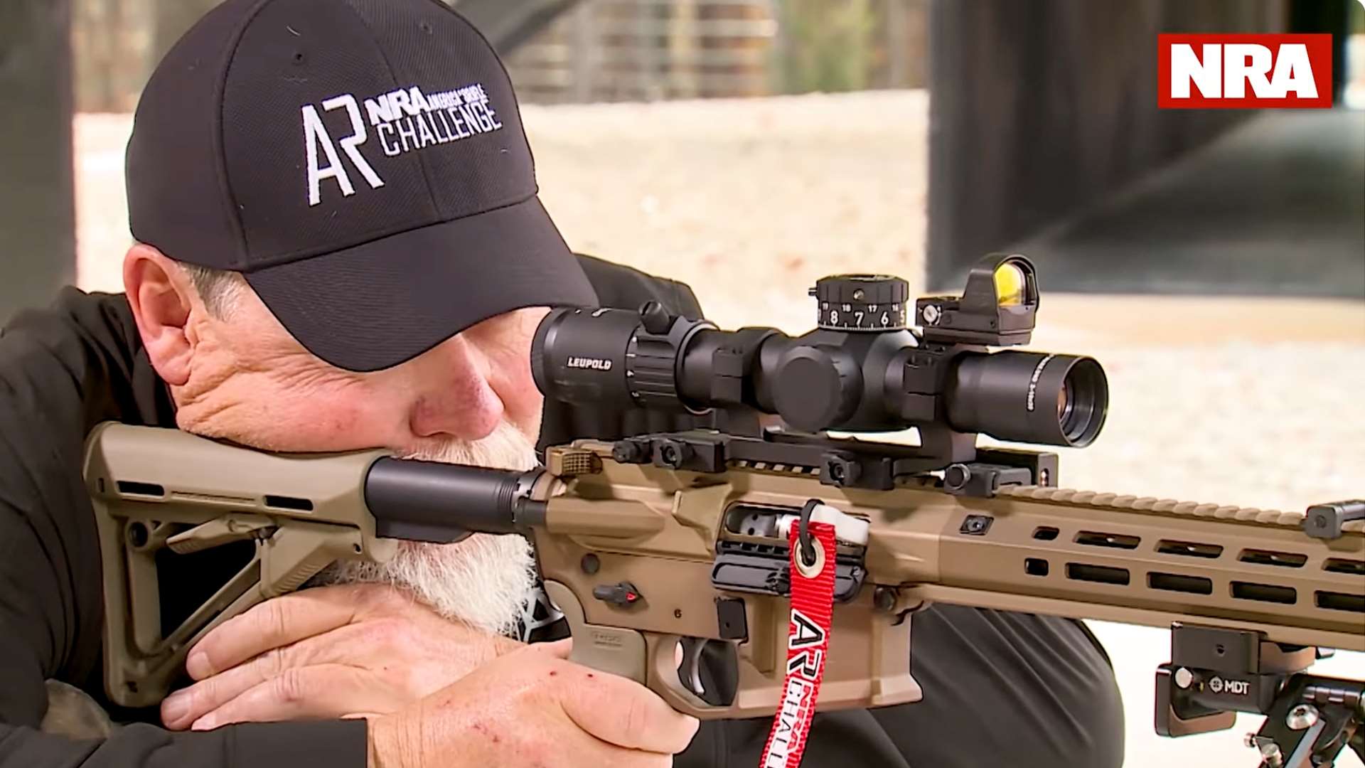 Kyle Lamb of Viking Tactics with a riflescope on an AR-15 during NRA America’s Rifle Challenge optics mounting instructional video