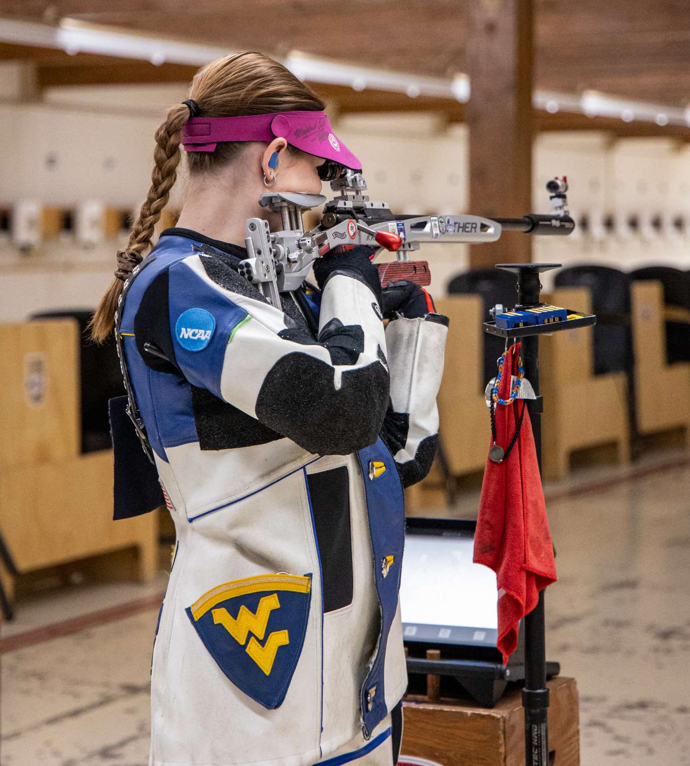 Lady smallbore competitor in standing position takes aim during the 2026 Rifle Fall Selection Match