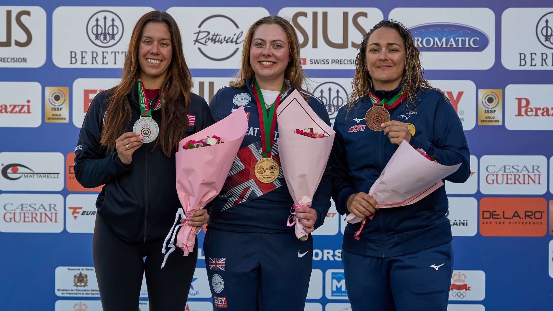 Dania Vizzi, Bethany Norton and Lucie Anastassiou on the 2026 ISSF World Cup Tangier women's skeet podium